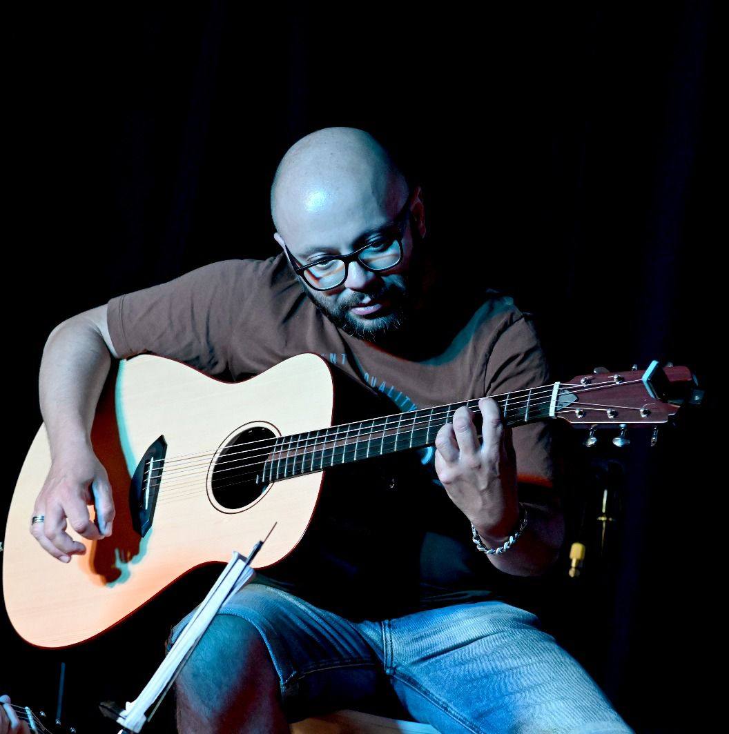 Discover the intimate, poetic guitar music of Mauro Caprile. From Mediterranean folk to ambient blues, his compositions evoke landscapes, silence, and emotion. Explore highlights like A Place to Call Home and Grecale, and let his strings carry you across Ligurian dreams.